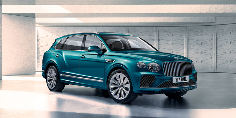 Bentley Surrey Bentley Bentayga Extended Wheelbase Azure SUV front three quarter in Topaz blue paint colour with a grey background