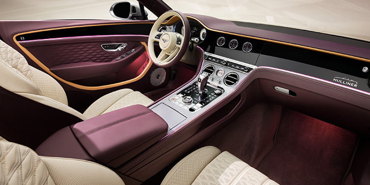 Bentley Surrey Bentley Continental GTC Mulliner convertible front interior including Linen and Damson purple hides and Grand Black veneer