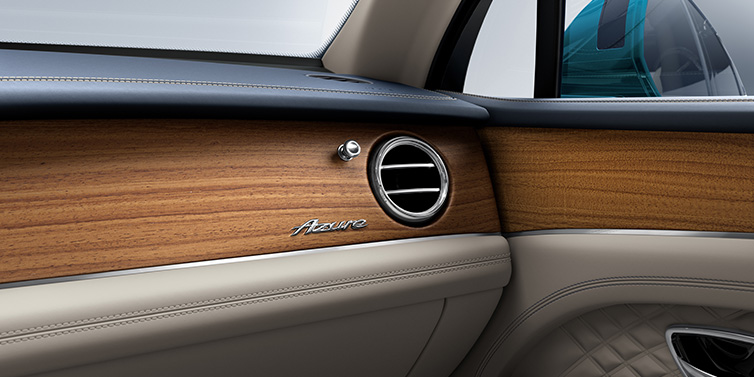 Bentley Surrey Bentley Bentayga Extended Wheelbase Azure front dash showing Open Pore Koa veneer surrounded by Portland and Imperial Blue hides